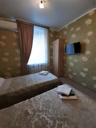 Отель Мини отель Атмосфера Липецк Двухместный номер с 2 отдельными кроватями-1